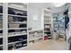 Spacious walk-in closet features custom shelving and ample storage solutions for clothes and accessories at 201 S Lafayette St, Denver, CO 80209
