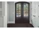 Welcoming foyer with a striking front door featuring glass panes and side doors at 201 S Lafayette St, Denver, CO 80209