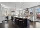 Bright kitchen with large island, stainless steel appliances, and modern design at 201 S Lafayette St, Denver, CO 80209