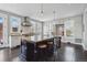 Bright kitchen features a large island, stainless steel appliances, and plenty of natural light from large windows at 201 S Lafayette St, Denver, CO 80209