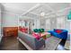 Spacious living room with fireplace, coffered ceiling, and modern decor at 201 S Lafayette St, Denver, CO 80209
