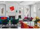 Stylish living room featuring a fireplace, modern furniture, and dining area in view at 201 S Lafayette St, Denver, CO 80209