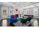 Bright living room with fireplace, modern furniture, and open layout at 201 S Lafayette St, Denver, CO 80209