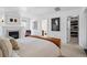 The main bedroom features a fireplace, sitting area, walk-in closet, and ensuite bathroom for ultimate relaxation at 201 S Lafayette St, Denver, CO 80209