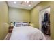 Bedroom featuring a cozy bed and a closet filled with clothing at 3130 N Race St, Denver, CO 80205