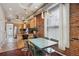 Modern kitchen with stainless steel appliances and eat-in dining area at 3130 N Race St, Denver, CO 80205