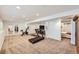 Open basement layout featuring home gym, entertainment area, and potential bedroom space at 6017 Merchant Pl, Parker, CO 80134