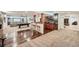 Entertaining basement with stone features, bar seating, home theater, and pool table at 6017 Merchant Pl, Parker, CO 80134