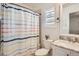 Bathroom with shower/tub combo and updated vanity at 6017 Merchant Pl, Parker, CO 80134