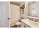 Simple bathroom with shower/tub combo and updated fixtures at 6017 Merchant Pl, Parker, CO 80134