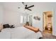 Cozy bedroom with ceiling fan and ensuite bathroom at 6017 Merchant Pl, Parker, CO 80134