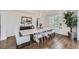 Formal dining room with hardwood floors and a chandelier at 6017 Merchant Pl, Parker, CO 80134