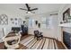 Home office with built-in shelving and a fireplace at 6017 Merchant Pl, Parker, CO 80134