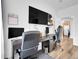 A modern office setup situated in a spacious room with contemporary furnishings at 5765 N Genoa Way # 1-103, Aurora, CO 80019