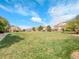 Well-manicured green space offering a picnic table for outdoor enjoyment at 5765 N Genoa Way # 1-103, Aurora, CO 80019