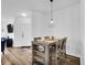 Cozy dining area with a wooden table and chairs, perfect for Gathering meals at 5765 N Genoa Way # 1-103, Aurora, CO 80019