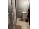 Cozy bathroom with tile flooring, modern vanity, a walk-in shower with neutral tones at 8220 W 90Th Pl # 2003, Broomfield, CO 80021