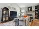 Cozy living room with modern decor, stylish furnishings, and a decorative fireplace at 8220 W 90Th Pl # 2003, Broomfield, CO 80021