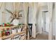 Hallway with playroom, curtains, shelves, decorations, and playful design at 8220 W 90Th Pl # 2003, Broomfield, CO 80021