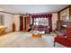 Mid-century living room with fireplace and large window at 2250 Grape Ave, Boulder, CO 80304