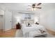 A stylish bedroom features a comfortable bed with two side tables and hardwood flooring at 3981 S Boston St, Denver, CO 80237