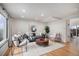 Bright living room features recessed lights, hardwood floors, and modern furnishings at 3981 S Boston St, Denver, CO 80237