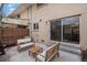 Cozy patio seating area perfect for outdoor relaxation and entertaining with access to the house at 3981 S Boston St, Denver, CO 80237