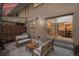 Cozy patio seating area perfect for outdoor relaxation and entertaining with access to the house at 3981 S Boston St, Denver, CO 80237