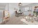 Staged bedroom designed as a playroom/office features neutral carpet and bright decor, ideal for versatile use at 1445 Colebrook Ct, Castle Rock, CO 80109