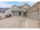 Charming two-story home with stone accents, neutral colored siding, and a well-manicured lawn at 1445 Colebrook Ct, Castle Rock, CO 80109