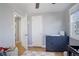 Well-designed Bedroom with blue dresser at 4260 Newland St, Wheat Ridge, CO 80033