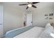 Spacious bedroom with a ceiling fan and serene natural light at 4260 Newland St, Wheat Ridge, CO 80033