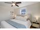 Cozy bedroom featuring a ceiling fan, and serene natural light at 4260 Newland St, Wheat Ridge, CO 80033