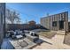 Modern backyard patio featuring a stylish seating area and minimalist landscaping, ideal for outdoor relaxation at 3829 Osage St, Denver, CO 80211
