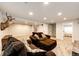 Finished basement featuring neutral walls, carpet and a door leading to a bedroom at 11335 Haswell Dr, Parker, CO 80134