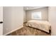 Cozy bedroom featuring carpeted floors, and a window offering natural light at 11335 Haswell Dr, Parker, CO 80134