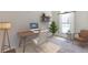 Bright home office space featuring modern decor, ample natural light and a contemporary design at 5872 W Asbury Pl, Lakewood, CO 80227