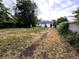 View of the home from the backyard, with plenty of space and grass at 1364 Iola St, Aurora, CO 80010