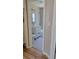 Charming view of the bathroom from the hallway showcasing the vanity and the bath at 1364 Iola St, Aurora, CO 80010