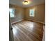 A bright bedroom with hardwood floors at 1364 Iola St, Aurora, CO 80010