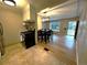 A beautifully presented kitchen flows into the dining room at 1364 Iola St, Aurora, CO 80010