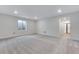 Bright basement featuring neutral walls, carpet, recessed lighting and a window at 3318 N Haleyville Ct, Aurora, CO 80019