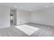 Bright bedroom featuring neutral walls, carpet, recessed lighting, and an ensuite entrance at 3318 N Haleyville Ct, Aurora, CO 80019