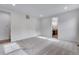 Spacious carpeted bedroom leading to a bright bathroom and closet spaces at 3318 N Haleyville Ct, Aurora, CO 80019