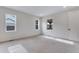 Bright bedroom with plush carpet, recessed lighting, and multiple windows at 3318 N Haleyville Ct, Aurora, CO 80019