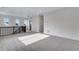 Bright bedroom featuring neutral walls, carpet, recessed lighting, and a railing at 3318 N Haleyville Ct, Aurora, CO 80019