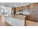 Modern kitchen showcasing granite countertops, stainless steel appliances, and ample cabinetry at 3318 N Haleyville Ct, Aurora, CO 80019