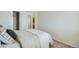 Cozy bedroom featuring neutral tones, soft bedding, and closet space, perfect for relaxation at 9544 Josephine St, Thornton, CO 80229
