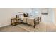 Bedroom with a metal frame bed, a patterned rug, and a view from the window at 9544 Josephine St, Thornton, CO 80229