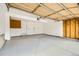 Spacious and clean garage with a finished floor, ample space, and an automatic door at 9544 Josephine St, Thornton, CO 80229